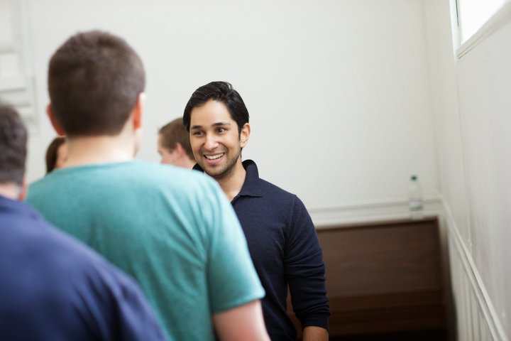 © J Tucker Two RADA Business participants take part in a warm-up.
