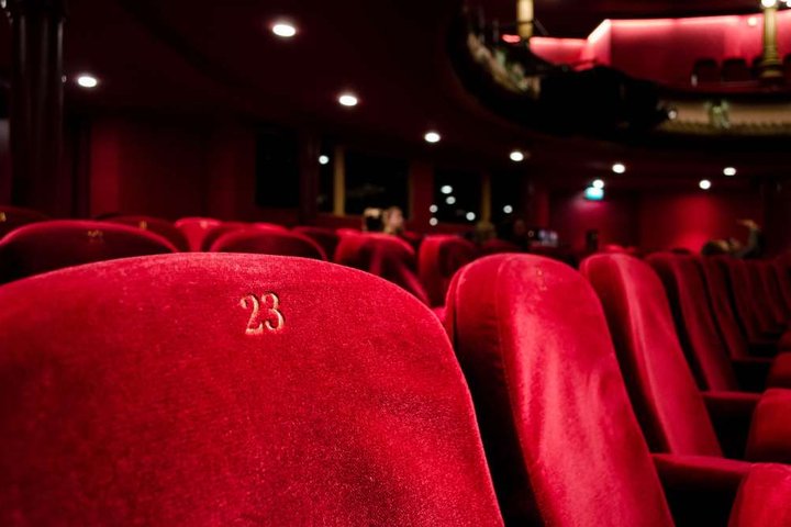 © Photo by Kilyan Sockalingum on Unsplash At the theatre - close up of seats