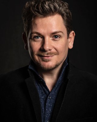 Picture of Kevin Trainor, RADA Business practitioner, looking to camera