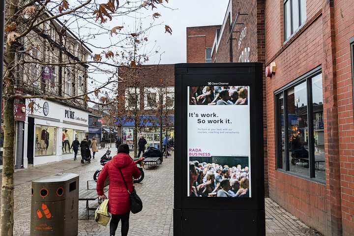 A RADA Business advertising poster is displayed.