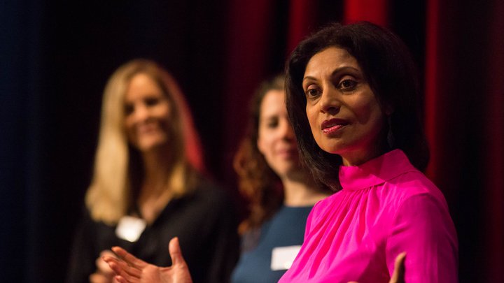 Women giving a speech at the Women's Network event
